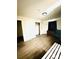 Bright bedroom with hardwood floors and ample closet space at 1016 Patricia Ave, Harrisburg, NC 28075