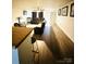 Bright living room with hardwood floors and a view of the kitchen at 1016 Patricia Ave, Harrisburg, NC 28075