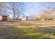 Large backyard with a shed and mature trees at 1028 White Ln, Gastonia, NC 28052