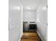 Laundry room with washer and dryer, hardwood floors and a door at 1028 White Ln, Gastonia, NC 28052