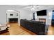 Spacious living room with hardwood floors, fireplace and sectional sofa at 1028 White Ln, Gastonia, NC 28052