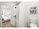 Main bathroom with a bathtub, toilet, and view of the bedroom at 103 Fairview St, Mount Holly, NC 28120