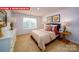 Cozy bedroom with natural light, carpet flooring, and neutral decor at 11127 Cardinal Creek Ave, Charlotte, NC 28215