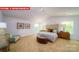 Primary bedroom featuring a bed, a neutral color palette, and lots of natural light at 11127 Cardinal Creek Ave, Charlotte, NC 28215