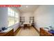 Bright office space with hardwood floors, a large window, and natural light at 11127 Cardinal Creek Ave, Charlotte, NC 28215