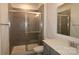 Modern bathroom showcases a glass-enclosed shower, vanity, and sleek mirror at 1136 Yellow Springs Dr, Huntersville, NC 28078
