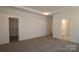 Bedroom with walk-in closet and ensuite bathroom offering space and ample storage at 1136 Yellow Springs Dr, Huntersville, NC 28078