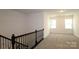 Upstairs room features natural light and carpeted floors at 1136 Yellow Springs Dr, Huntersville, NC 28078