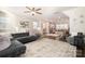 Open concept living room with kitchen view at 11645 Red Rust Ln, Charlotte, NC 28277