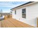 New deck with stairs leading to backyard at 117 Falls Rd, Badin, NC 28009