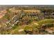 Aerial view of a neighborhood near a golf course at 11805 Farnborough Rd, Huntersville, NC 28078