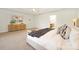 Bright main bedroom featuring a sitting area, wooden accents, and comfortable design at 11805 Farnborough Rd, Huntersville, NC 28078