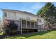 Exterior elevation of a two-story house featuring a back porch and a yard at 11805 Farnborough Rd, Huntersville, NC 28078