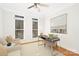 Bright home office with hardwood floors, neutral decor, and natural light at 11805 Farnborough Rd, Huntersville, NC 28078