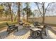 Fire pit area with stone seating and landscaping at 1795 Faulkner Rd, Clover, SC 29710