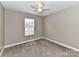 Bright bedroom with ceiling fan and carpet flooring at 1855 Bardell St, Lancaster, SC 29720