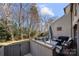 Outdoor deck featuring a seating area, grill, and partial view of backyard at 204 Riverview Ter, Lake Wylie, SC 29710
