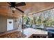 Outdoor deck featuring bar with beer cap designs and outdoor seating area at 204 Riverview Ter, Lake Wylie, SC 29710