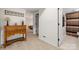Hallway with a dresser, leading to a bedroom and bathroom at 204 Riverview Ter, Lake Wylie, SC 29710