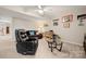 Finished basement living room with comfortable seating and car themed decor at 204 Riverview Ter, Lake Wylie, SC 29710