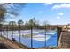 Enjoy a game on the community tennis courts featuring well-maintained surfaces and fencing at 204 Riverview Ter, Lake Wylie, SC 29710
