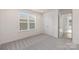 Spacious bedroom with double-door closet and large window at 2109 Gemway Dr, Charlotte, NC 28216