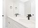 Modern bathroom with double vanity and updated fixtures at 2113 Gemway Dr, Charlotte, NC 28216