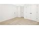 Spacious bedroom with neutral decor and double door closet at 2113 Gemway Dr, Charlotte, NC 28216