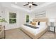 Spacious primary bedroom with large windows and plush carpet at 2113 Gemway Dr, Charlotte, NC 28216
