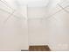 Walk-in closet with wire shelving and hanging rods at 2113 Gemway Dr, Charlotte, NC 28216