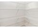 Walk-in pantry with ample wire shelving for storage at 2113 Gemway Dr, Charlotte, NC 28216