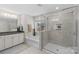 Bathroom with soaking tub, walk-in shower, and granite vanity at 2151 Black Forest Cv, Concord, NC 28027