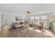 Light-filled living room with neutral decor and hardwood floors at 2151 Black Forest Cv, Concord, NC 28027