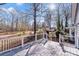 Spacious back deck overlooks private backyard with mature trees at 217 E Old Highway 74 Hwy # 4, Monroe, NC 28112