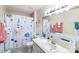 Clean bathroom with shower/tub combo and updated vanity at 217 E Old Highway 74 Hwy # 4, Monroe, NC 28112