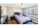 Cozy bedroom with hardwood floors and a ceiling fan at 217 E Old Highway 74 Hwy # 4, Monroe, NC 28112