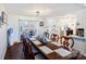 Formal dining room with a large wood table and access to the kitchen at 217 E Old Highway 74 Hwy # 4, Monroe, NC 28112