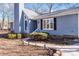 Charming home features a walkway leading to the front door and brick detailing at 217 E Old Highway 74 Hwy # 4, Monroe, NC 28112