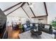 Open concept living area with hardwood floors and sectional sofa at 217 E Old Highway 74 Hwy # 4, Monroe, NC 28112