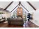 Living room with hardwood floors, fireplace, and large sectional sofa at 217 E Old Highway 74 Hwy # 4, Monroe, NC 28112