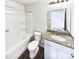 Full bathroom with granite countertop, tub, and toilet at 241 Century Dr, Salisbury, NC 28147