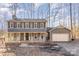 Two-story house with gray siding, front porch, and attached garage at 2817 Desmond Pl, Charlotte, NC 28210