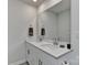 Bathroom with double vanity and large mirror at 3937 Woodland View Dr, Charlotte, NC 28215