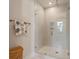 Large walk in shower with glass enclosure and modern tile at 4115 Nolen Creek Ave, Charlotte, NC 28209