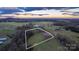 Aerial view showing house, barn and surrounding property at 50 Berea Church Quincy Rd, Hiddenite, NC 28636