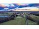 Aerial view showcasing expansive property with surrounding fields at 50 Berea Church Quincy Rd, Hiddenite, NC 28636