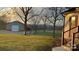 Landscaped backyard with detached garage and mountain views at 50 Berea Church Quincy Rd, Hiddenite, NC 28636