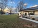 House exterior with a porch and stone accents at 50 Berea Church Quincy Rd, Hiddenite, NC 28636