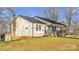 Charming one-story home with a metal roof and stone accents at 50 Berea Church Quincy Rd, Hiddenite, NC 28636