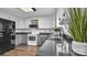 Modern kitchen with gray and white cabinets, granite countertops at 50 Berea Church Quincy Rd, Hiddenite, NC 28636